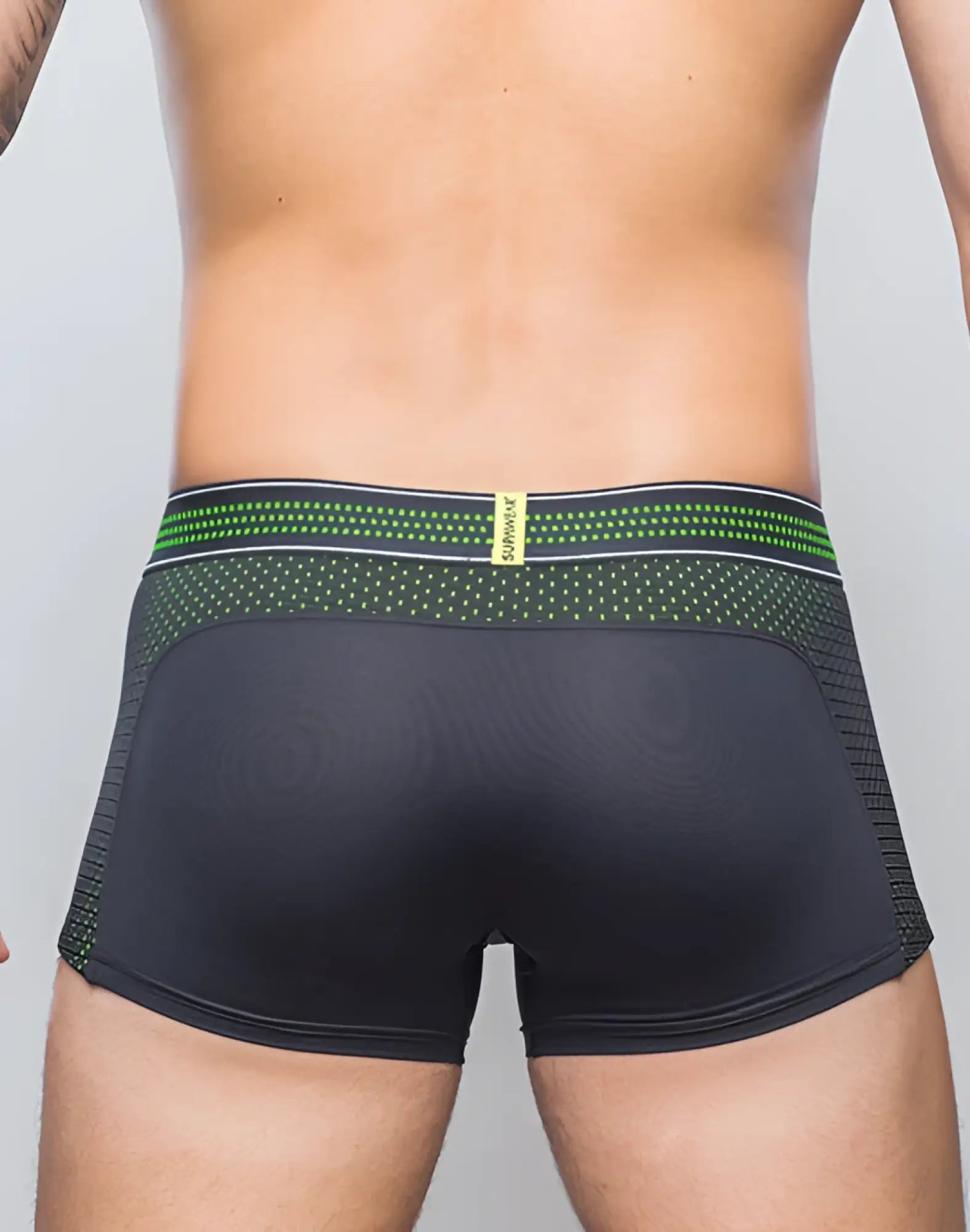 Black supawear neon mesh trunk underwear with neon green and white patterned waistband and sunwarrior label