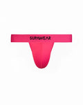 SupaWear neon thong underwear in bright pink with smooth stretchy fabric and black logo on the waistband back side