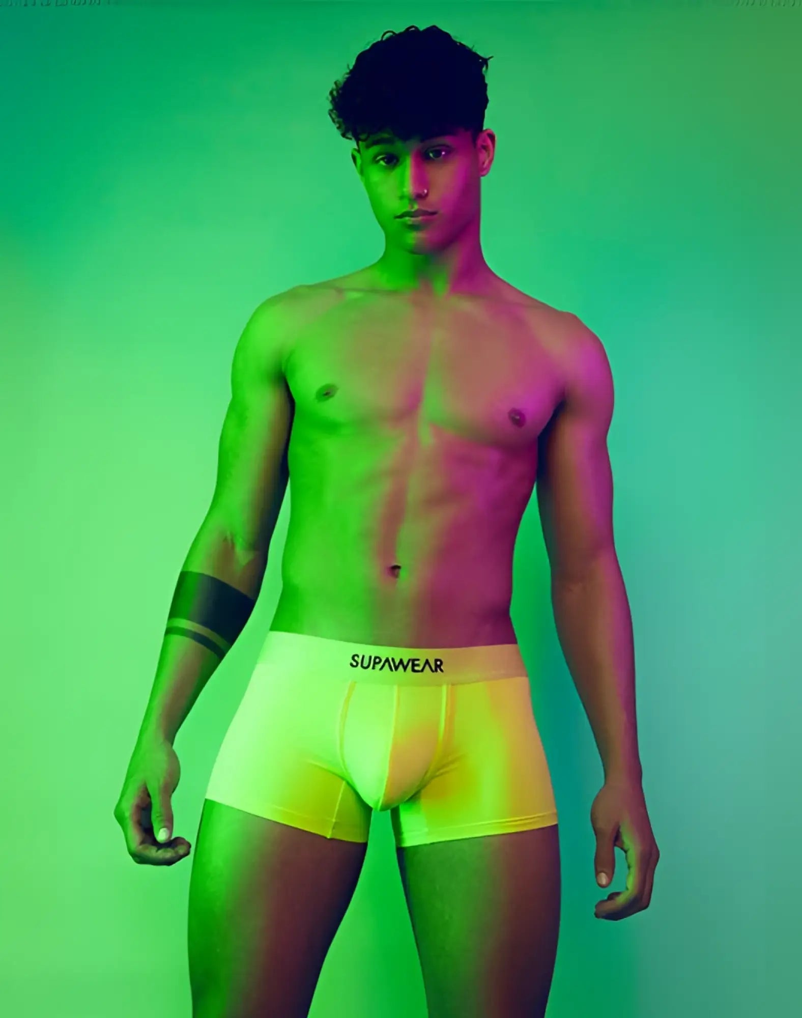 Bright yellow supawear neon trunk underwear with black waistband and white brand name for comfortable daily wear