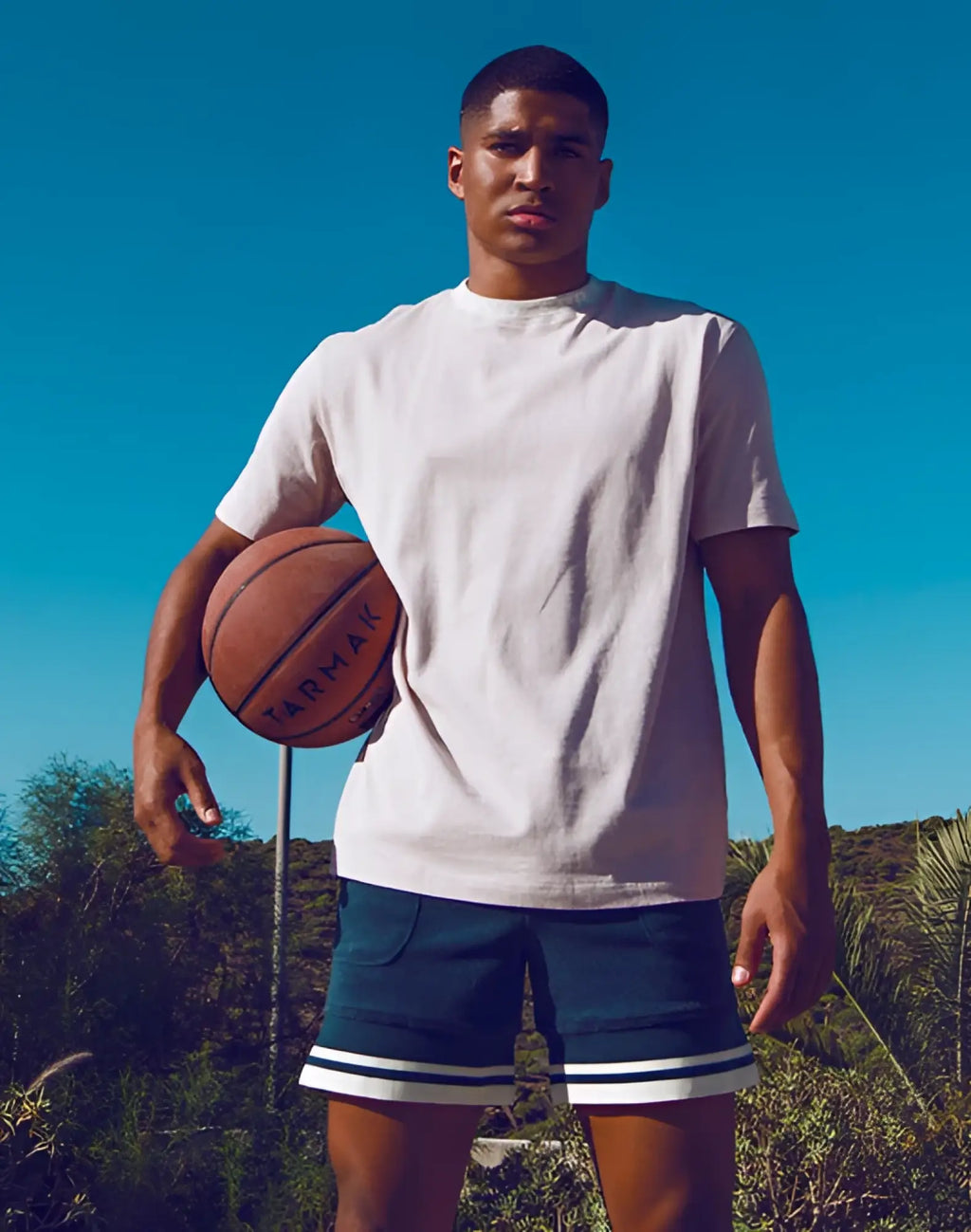Brown leather basketball with tarmac lettering featured on the supawear oversized tee moon beam beige