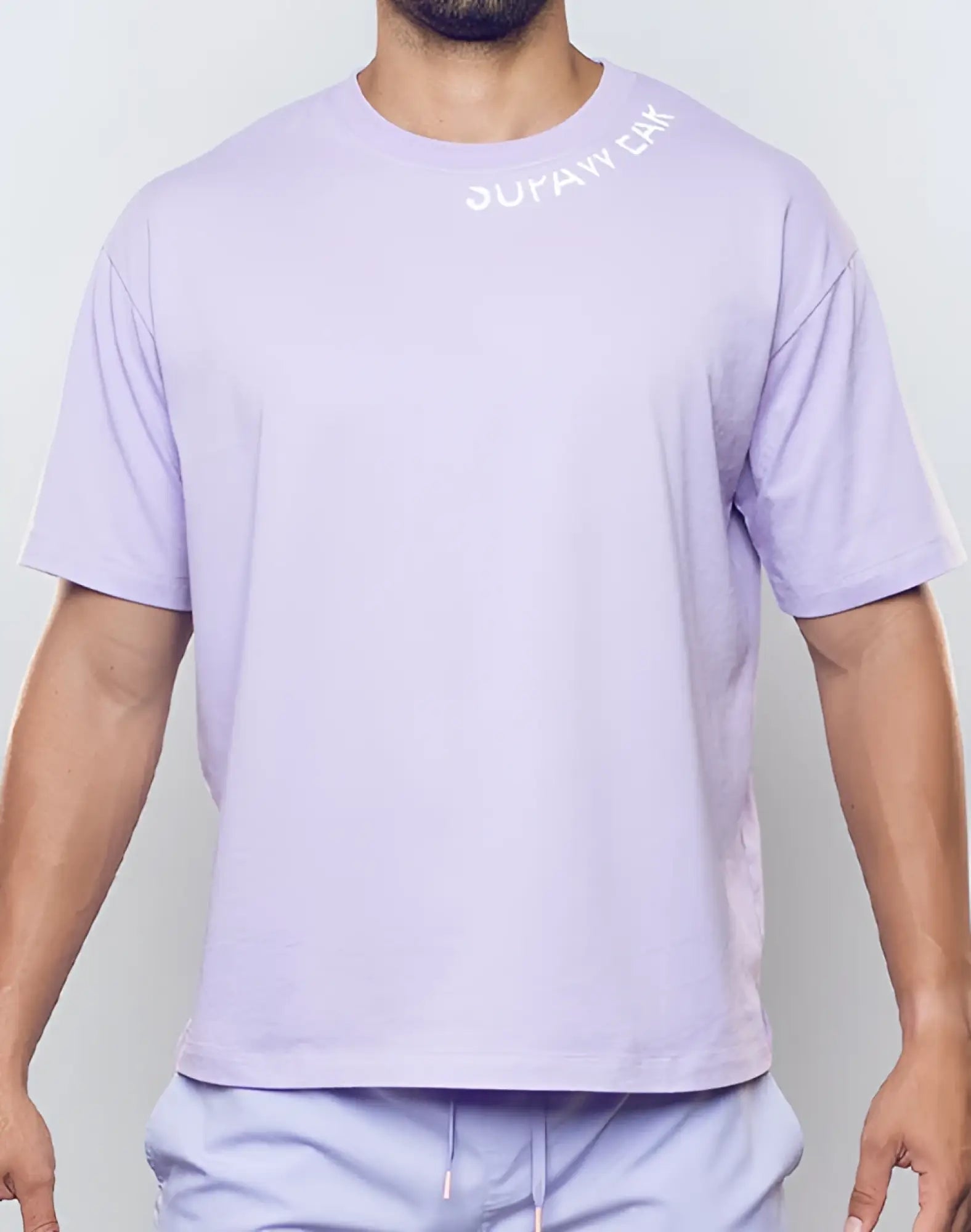 Lavender purple heather crew neck t-shirt with short sleeves and subtle white duraw caa logo on upper chest