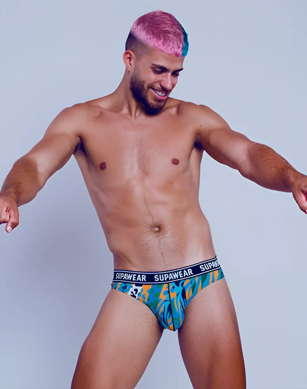 Supawear pow brief underwear arctic animal with vibrant turquoise and yellow tropical print and black waistband