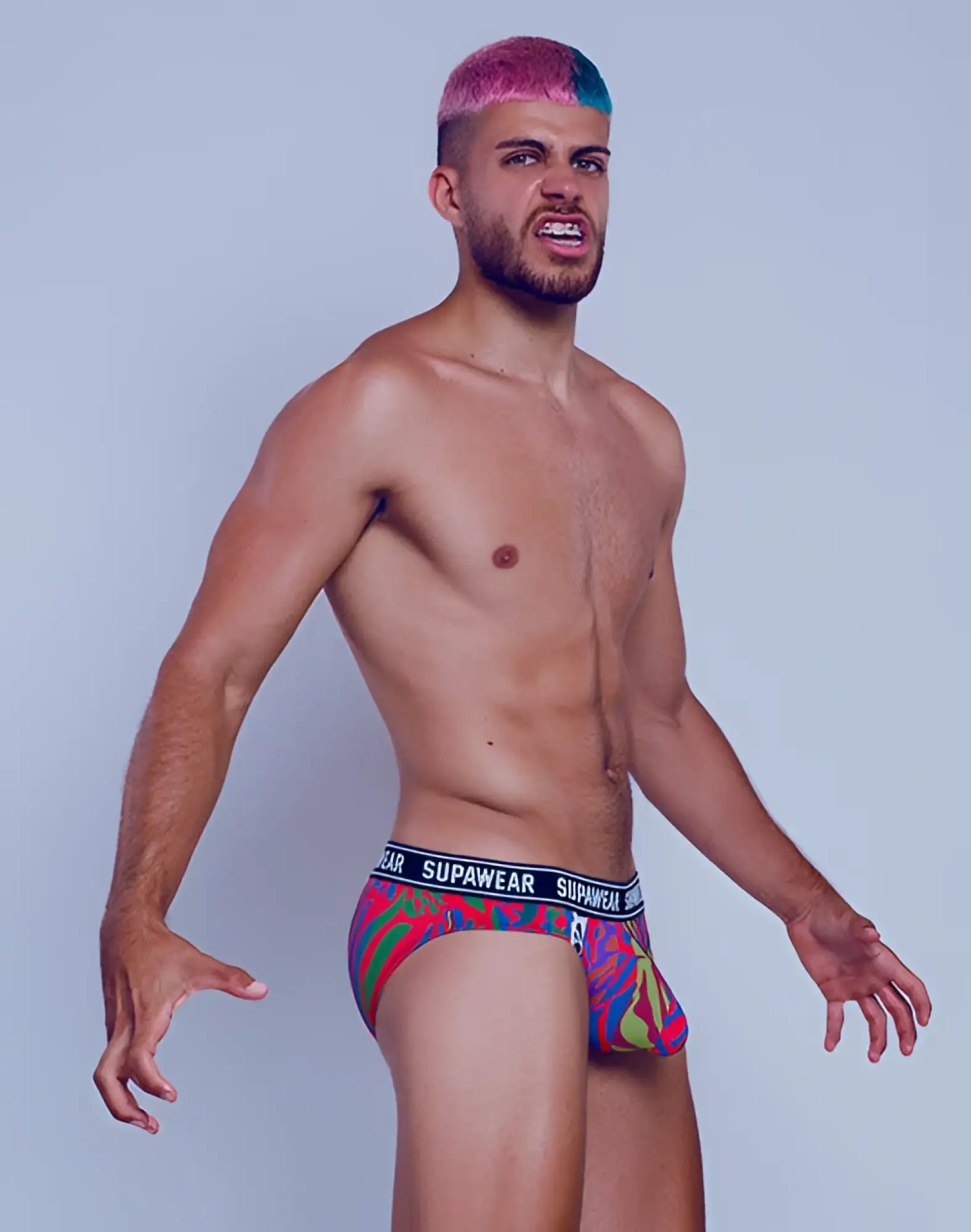 SupaWear POW brief underwear with vibrant multicolored red and green patterned supawear design for bold style