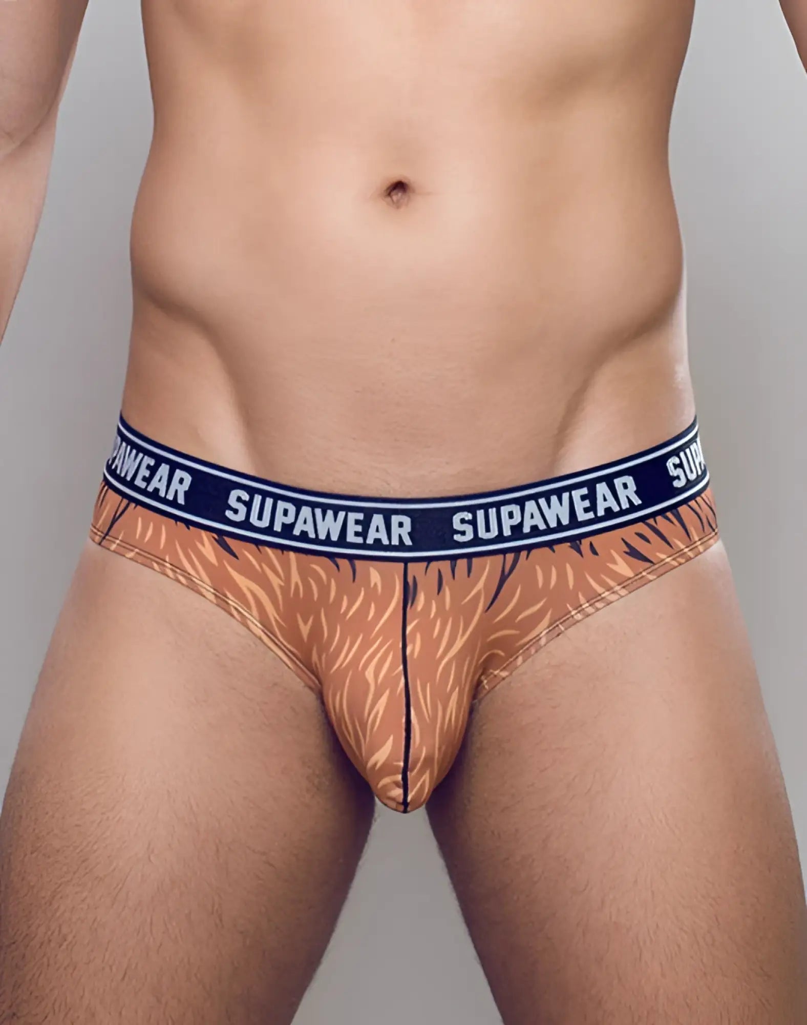 SupaWear Pow brief underwear in orange tiger print with navy blue waistband featuring white SupaWear branding