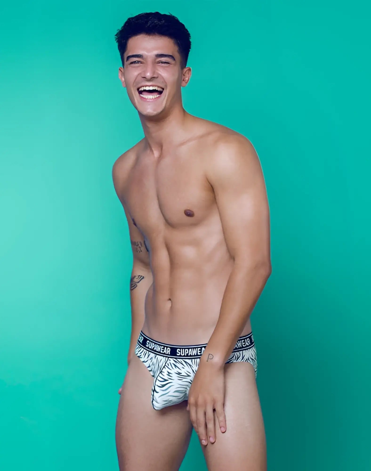 White and black zebra print supawear pow brief underwear with navy blue supawear waistband polar bear edition