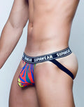 Supsawear pow jockstrap underwear in vibrant multicolored flame pattern with black waistband and white brand lettering