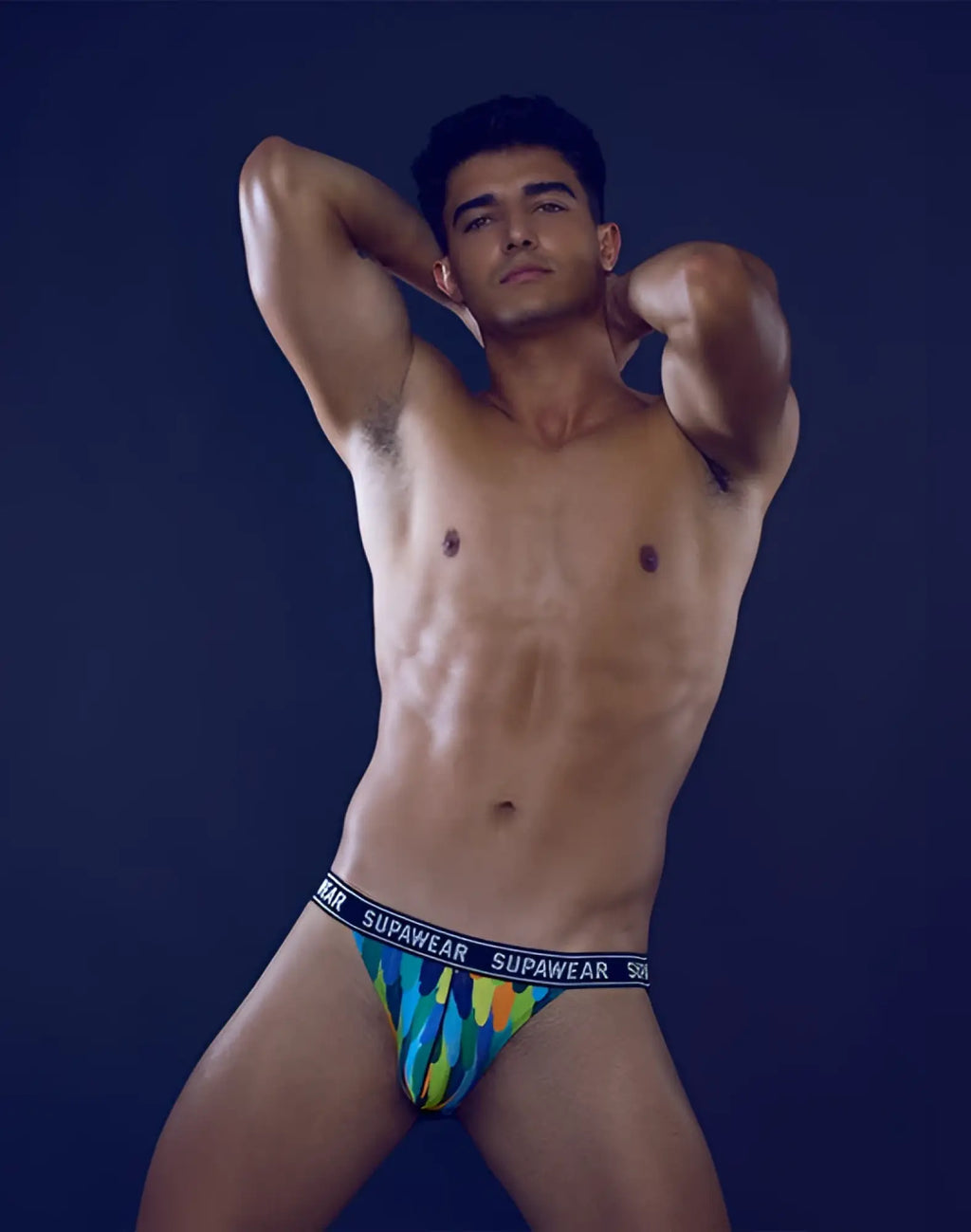 SupaWear Pow jockstrap underwear featuring vibrant blue green and yellow tie-dye patterned supawear briefs