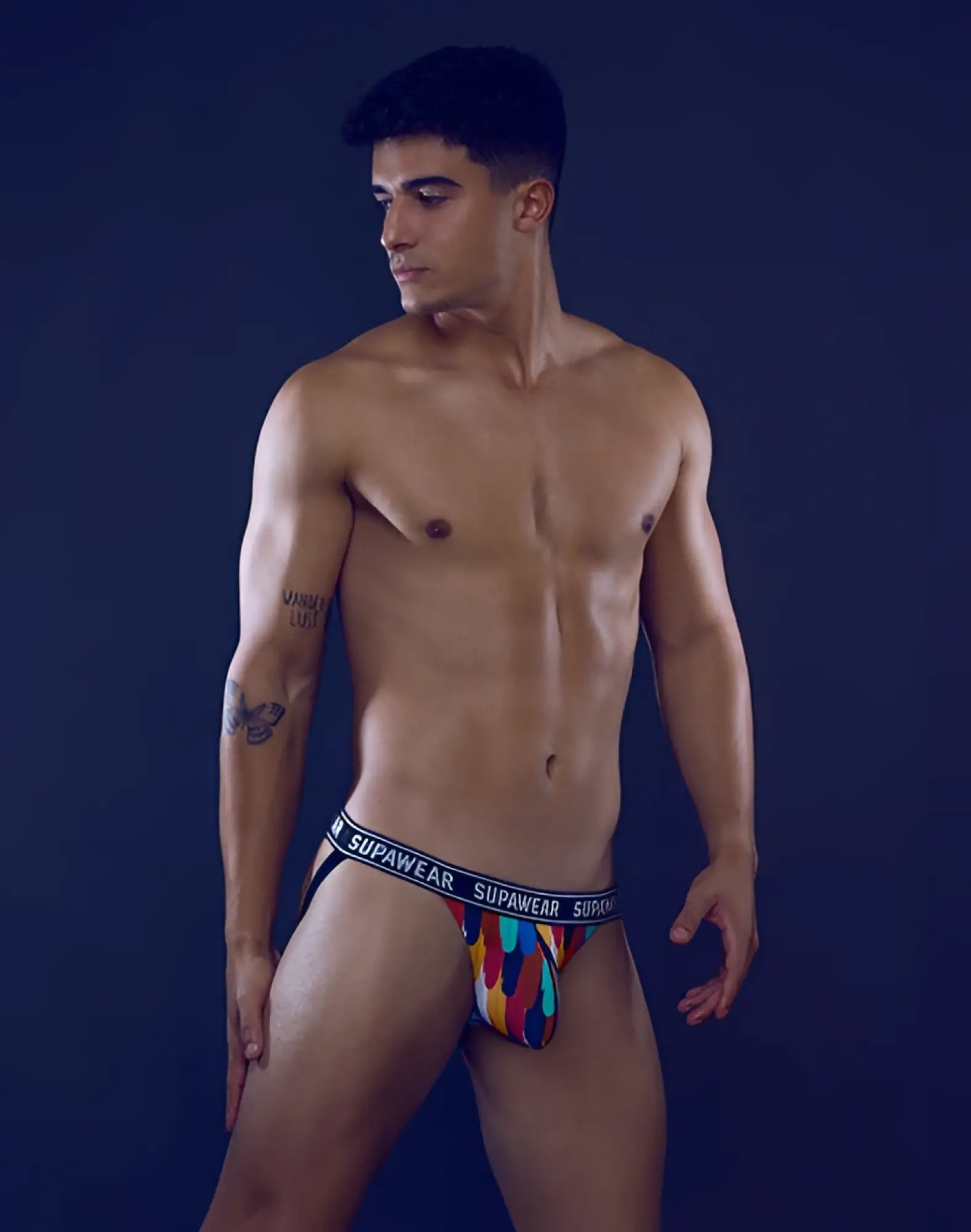 SupaWear pow jockstrap underwear with colorful abstract pattern and black waistband featuring SupaWear branding