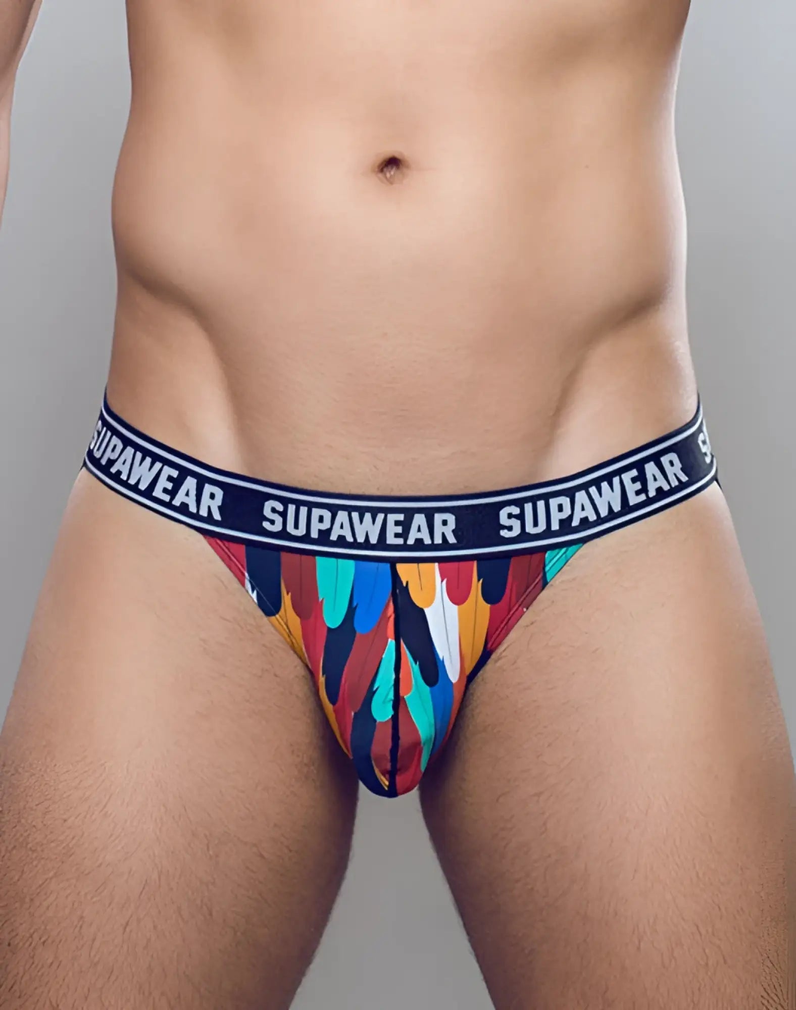 SupaWear Pow jockstrap underwear with vibrant multicolored feather pattern and navy blue waistband with white branding