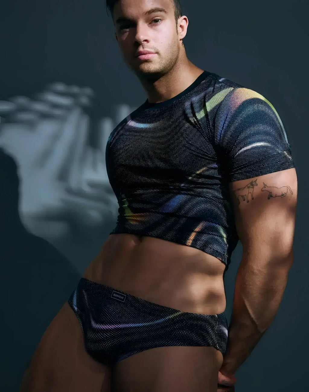 Black mesh crop top and briefs with iridescent rainbow stripes and subtle supawear logo printed pride underwear