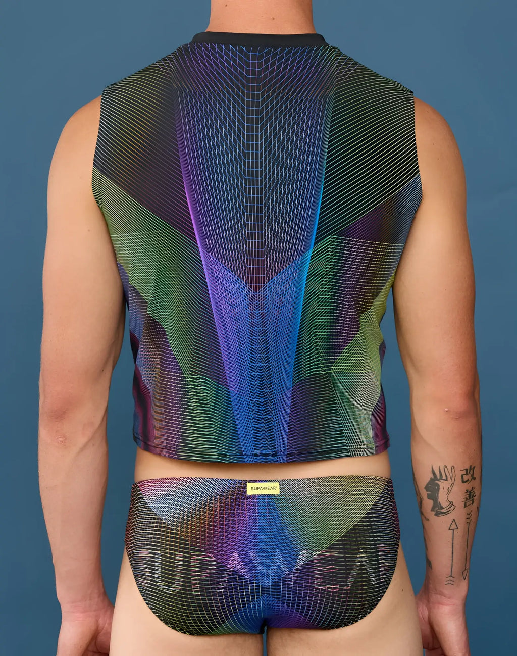 SupaWear printed pride crop tank in vibrant iridescent mesh with geometric grid in purple blue green and pink