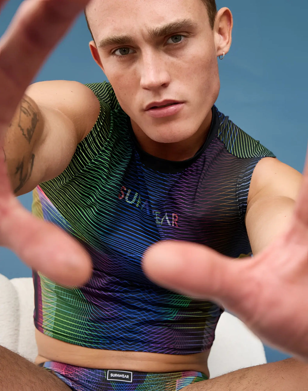 SupaWear printed pride crop tank in iridescent green blue and purple gradient sleeveless top with vibrant colors