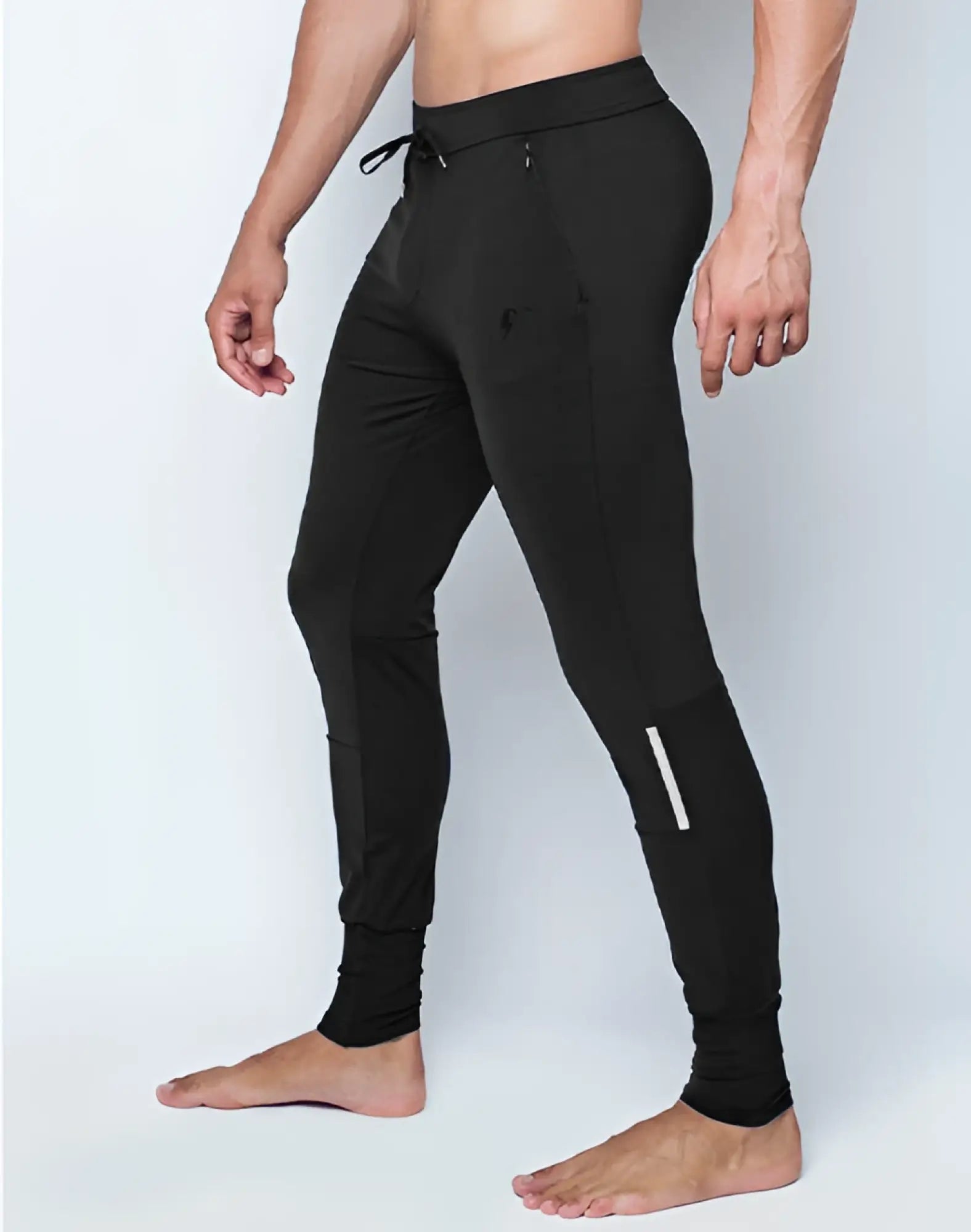 Black supawear pro-training athletic joggers with drawstring waist side pockets and reflective lower leg stripes