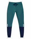 SupaWear pro-training pants in boost green teal and navy blue with white reflective side stripes for active wear