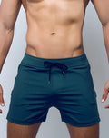 SupaWear pro-training shorts in dark teal with matching drawstring waistband designed for athletic performance