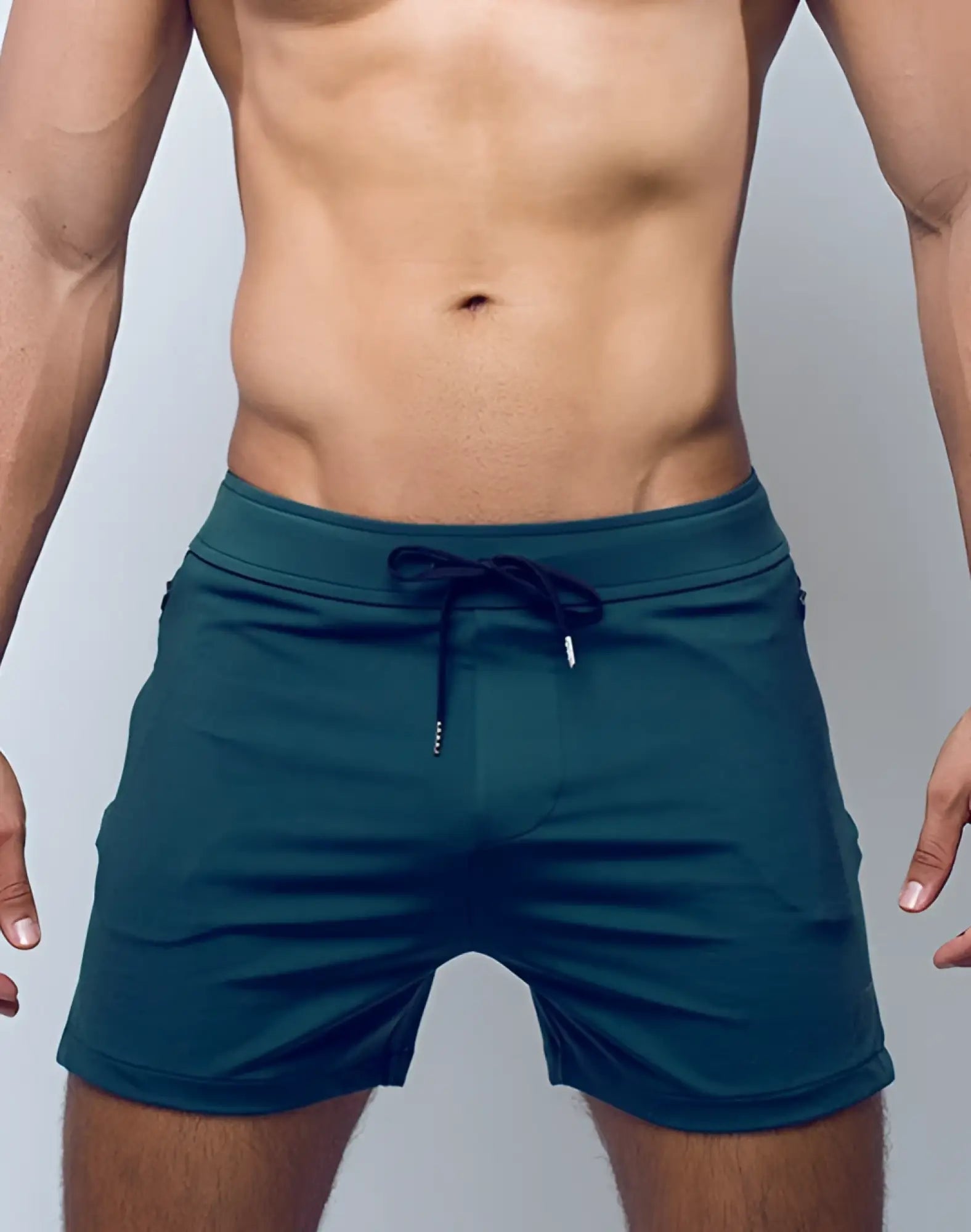 SupaWear pro-training shorts in dark teal with matching drawstring waistband designed for athletic performance