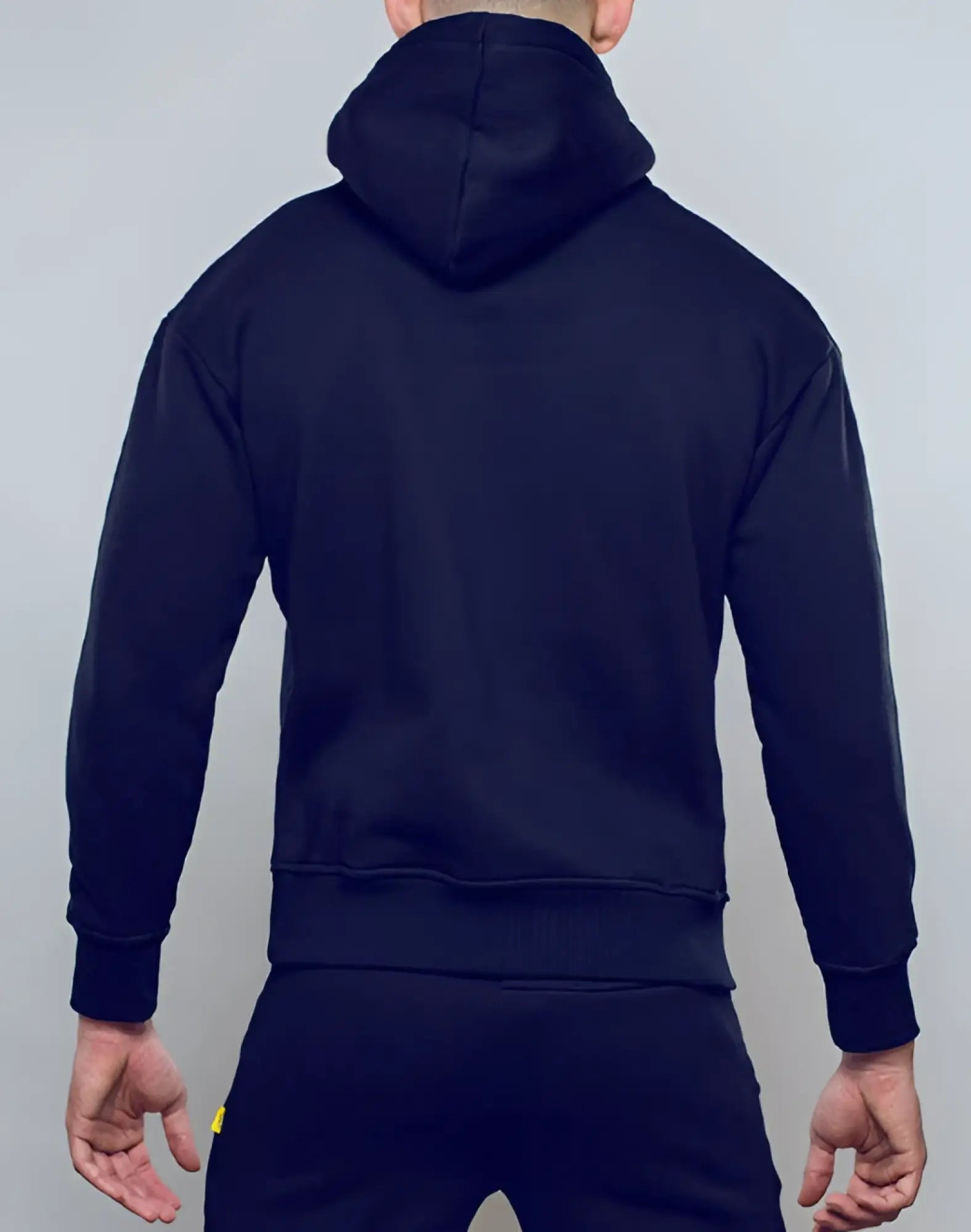 Black SUPAWEAR Recovery Hoodie made of soft fabric with ribbed cuffs and waistband for comfortable wear