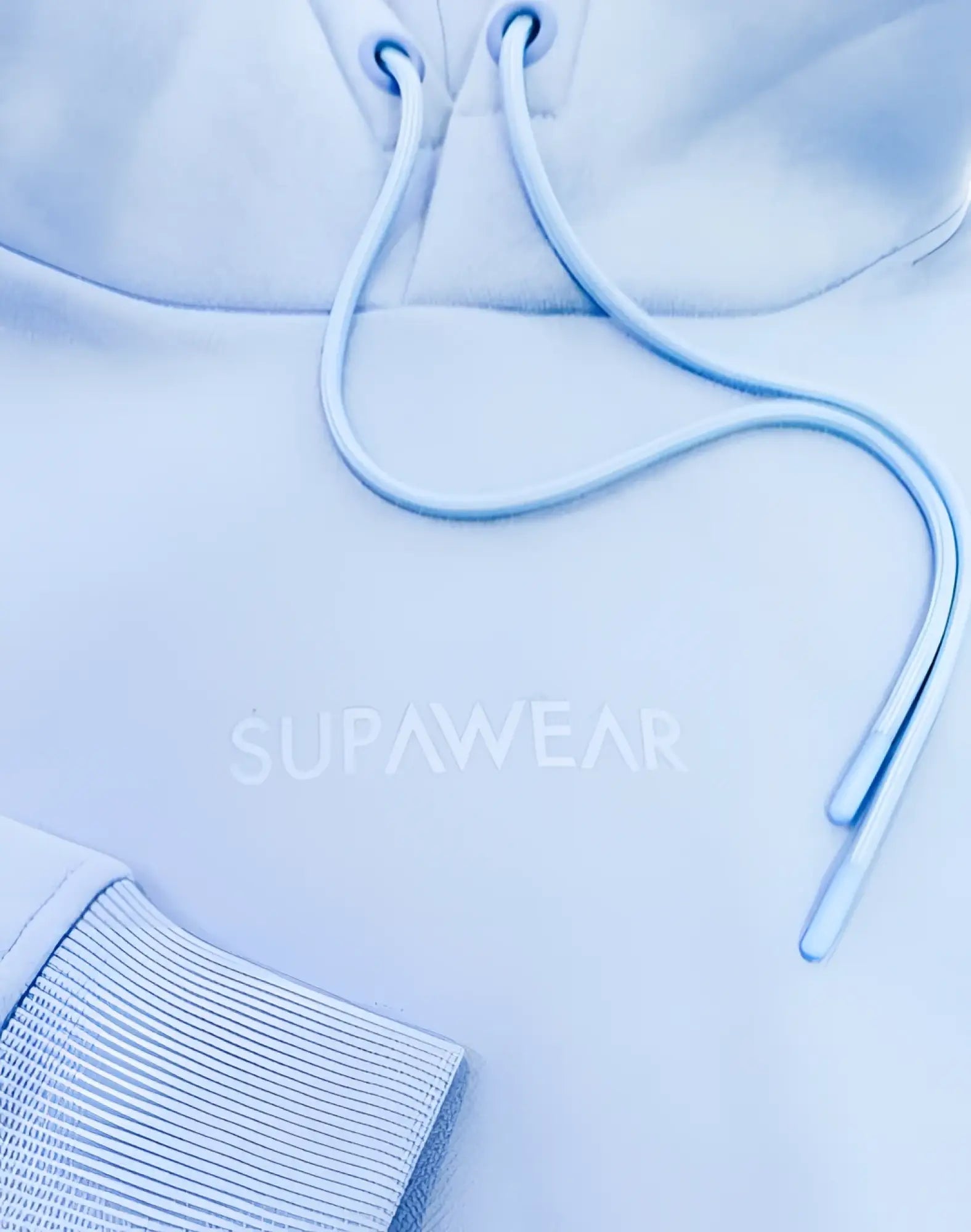 Light blue supawear recovery hoodie with matching drawstrings and ribbed cuffs in reboot blue color