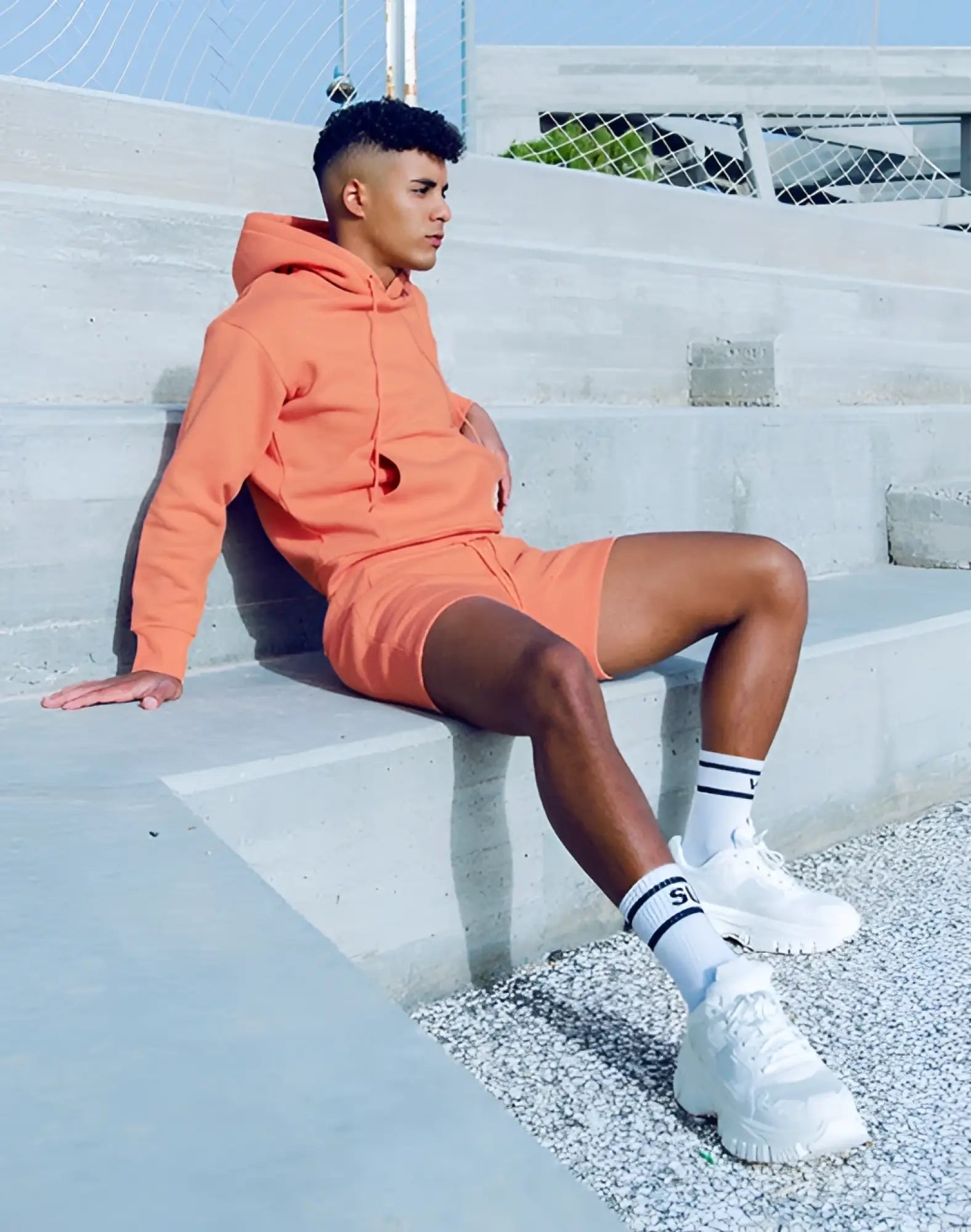Orange SUPAWEAR recovery hoodie and matching shorts set in soft lightweight fabric for comfortable reboot clay wear