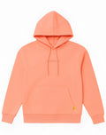 SupaWear recovery hoodie in soft peach clay with subtle embroidered logo and yellow tag on lower right sleeve