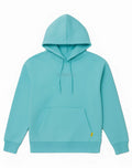 SupaWear recovery hoodie in soft mint green with subtle embroidered logo and yellow tag on bottom right hem