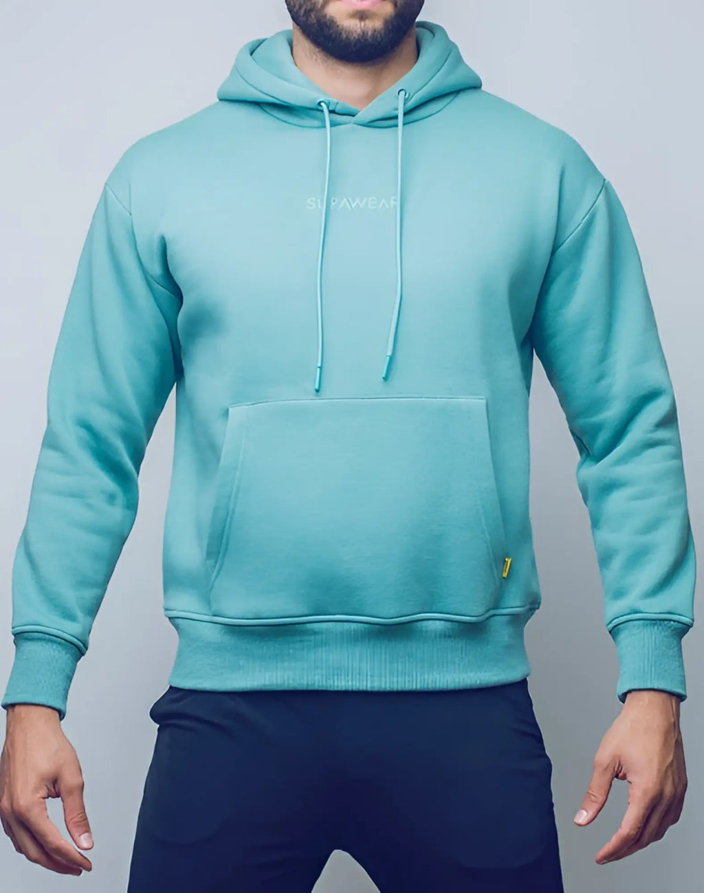 SupaWear recovery hoodie in reboot green features a teal soft fleece material with front pocket and matching drawstrings