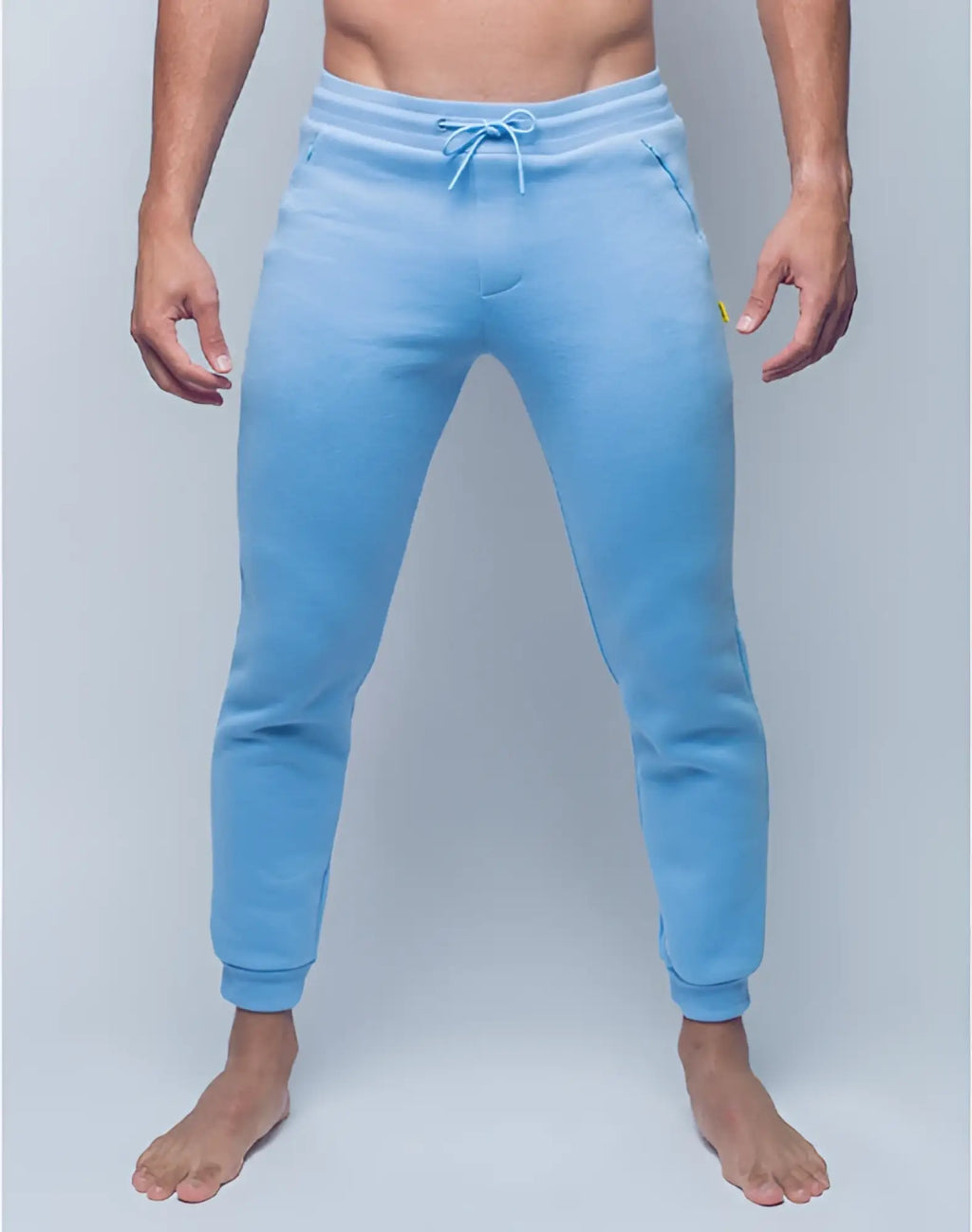 SupaWear recovery pants in reboot blue with light blue jogger style, matching drawstring, and subtle side pockets