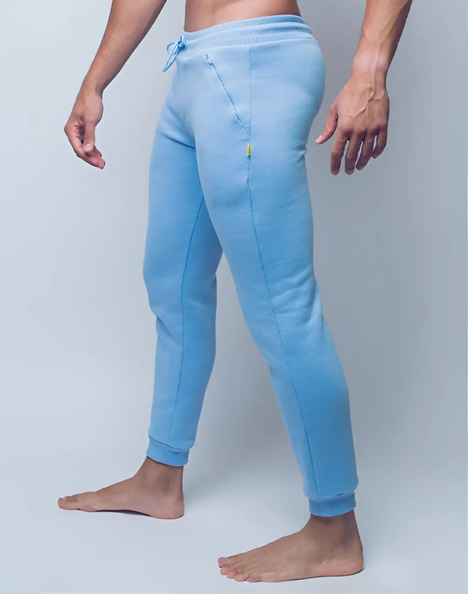 Light blue SUPAWEAR recovery jogger pants with drawstring waist and subtle side pockets for comfortable wear