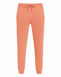 Coral-colored supawear recovery jogger pants with drawstring waistband and ribbed cuffs for comfort and style