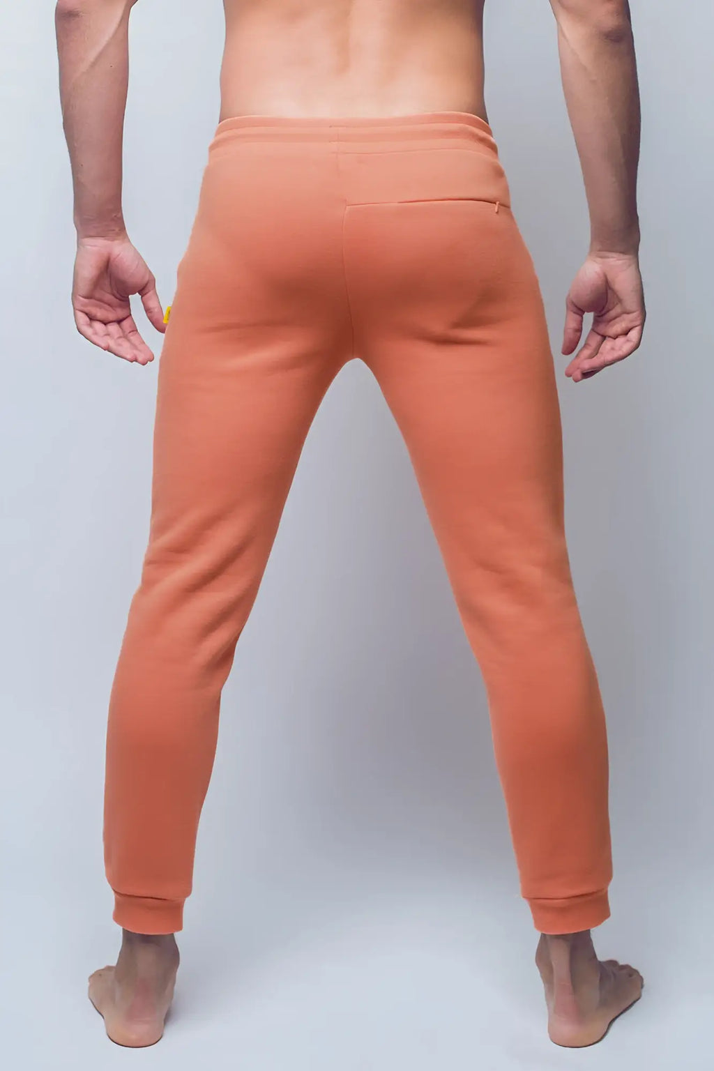 SupaWear recovery pants in reboot clay orange with soft stretchy fabric and ribbed cuffs for comfort and flexibility