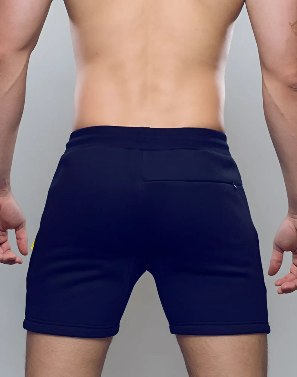Navy blue supawear recovery shorts with ribbed waistband and side pockets designed for athletic use