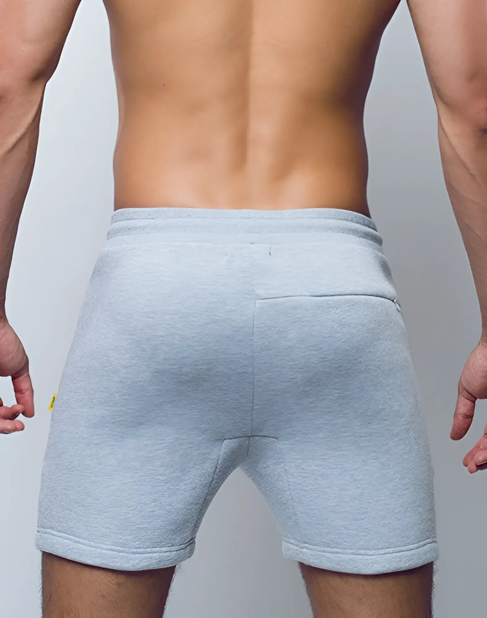 SupaWear recovery shorts in grey marle with ribbed waistband side pockets made from light gray heathered fabric