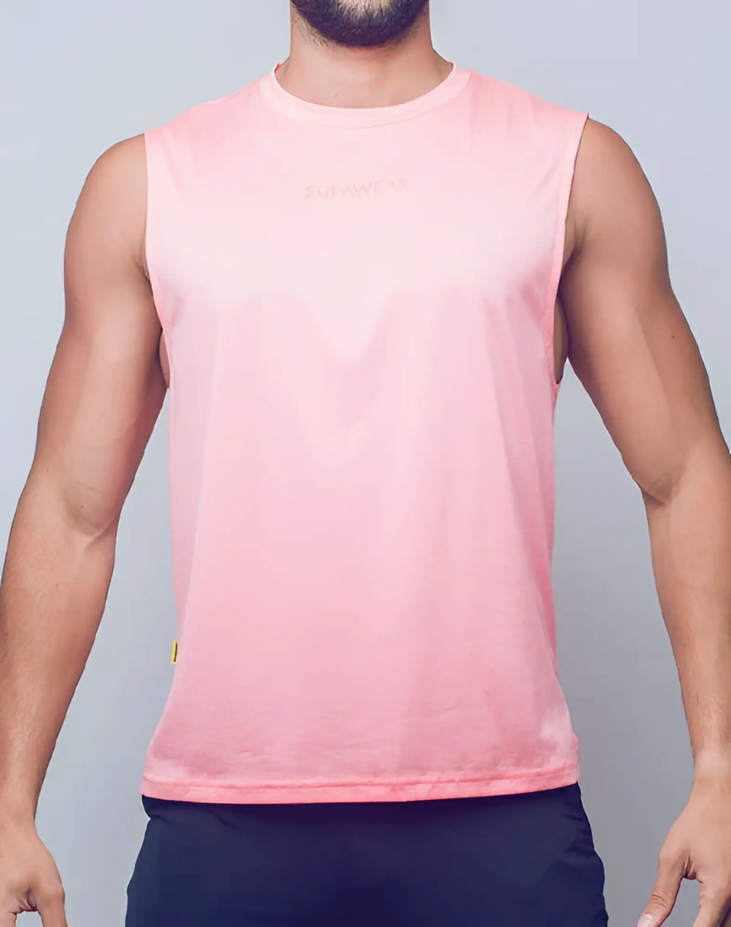 SupaWear recovery tank in soft pink with subtle gradient and embroidered sunwear logo for athletic wear