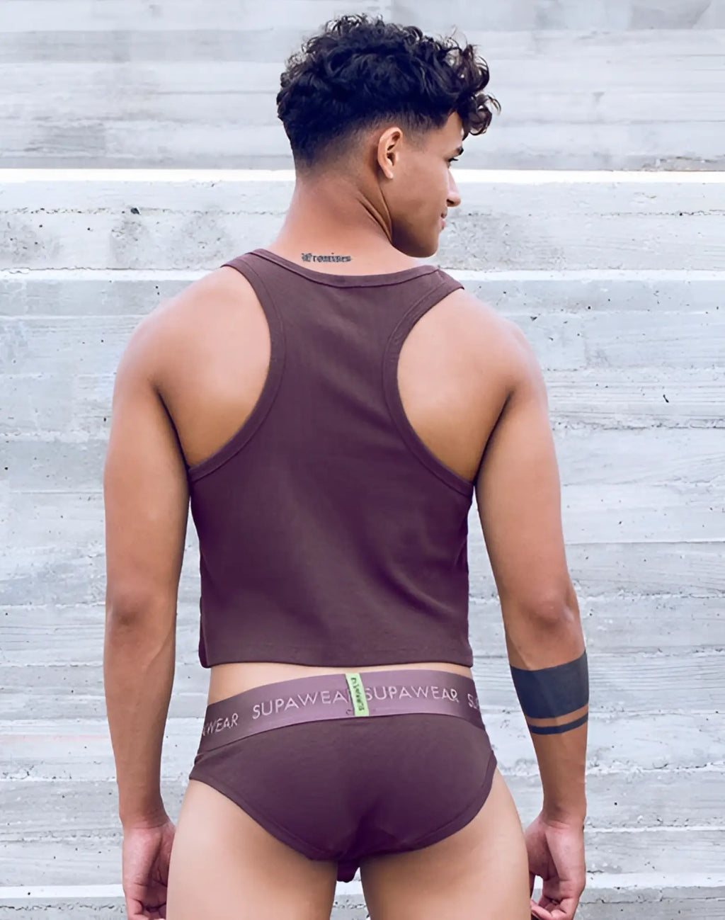 A maroon supawear ribbed crop tank top with racerback design and matching briefs in peppercorn color
