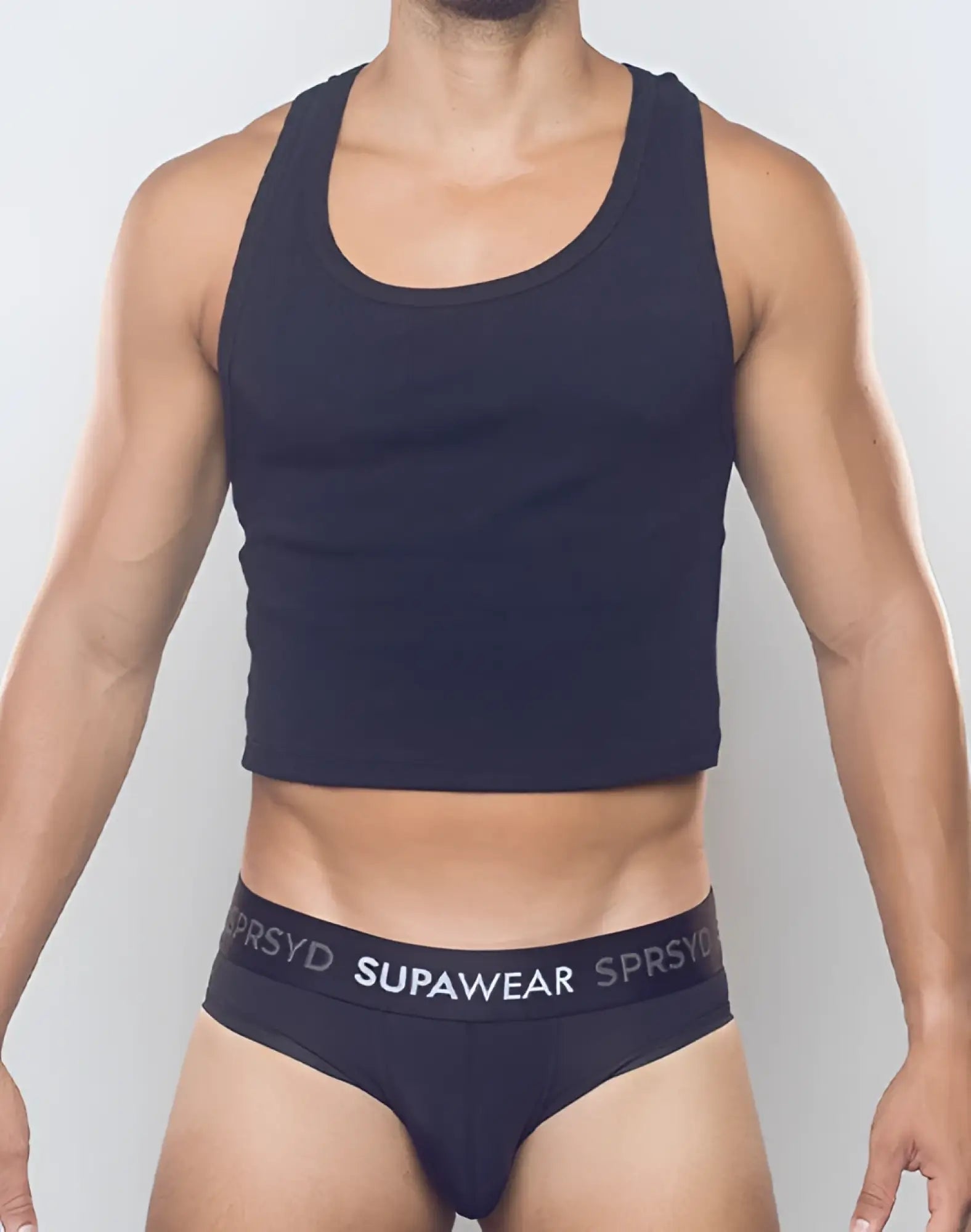 Black ribbed cropped singlet with scoop neckline and supawear logo on waistband of matching black briefs