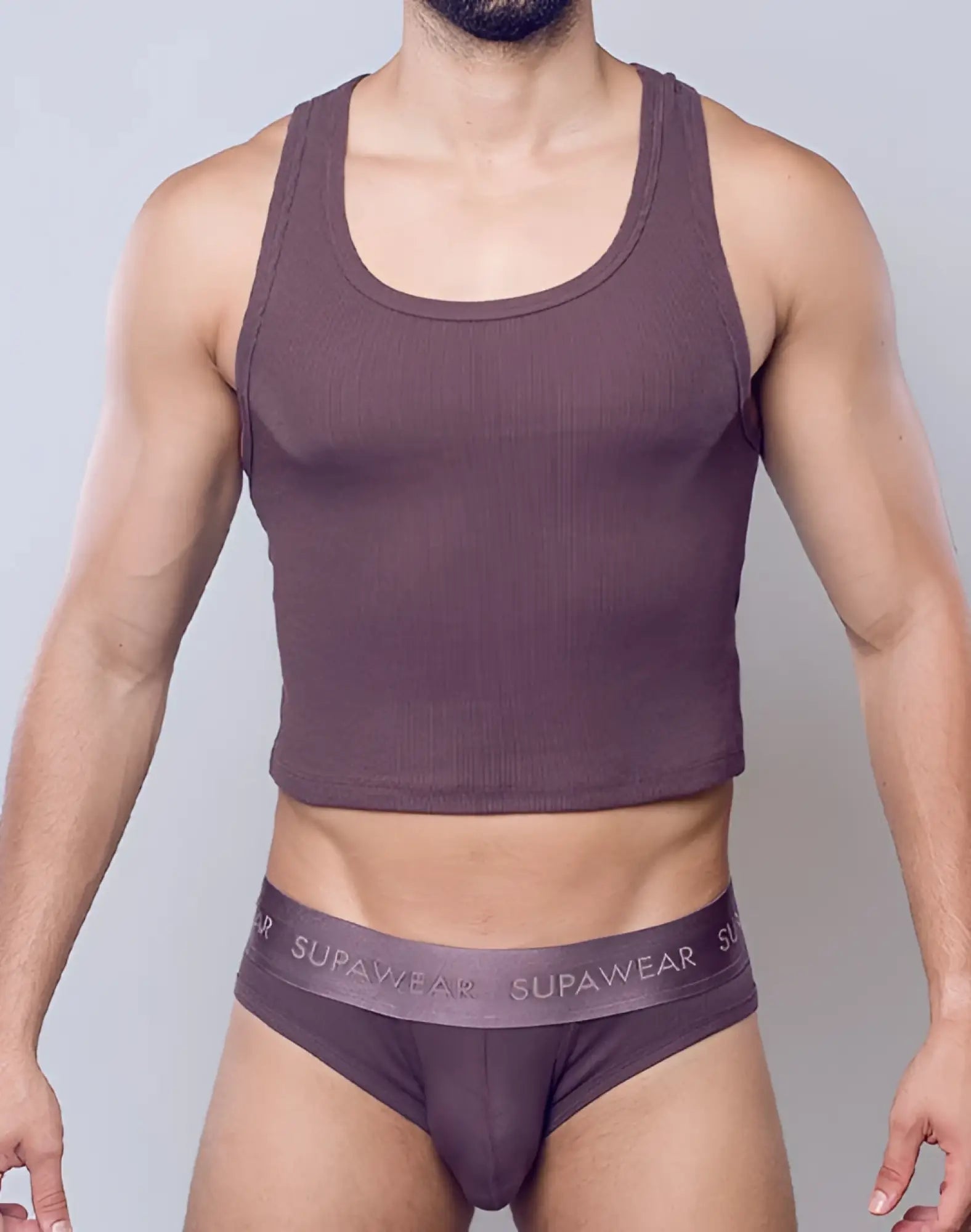 SupaWear ribbed cropped singlet in dark purple with scoop neckline and elasticized waistband made from soft fabric