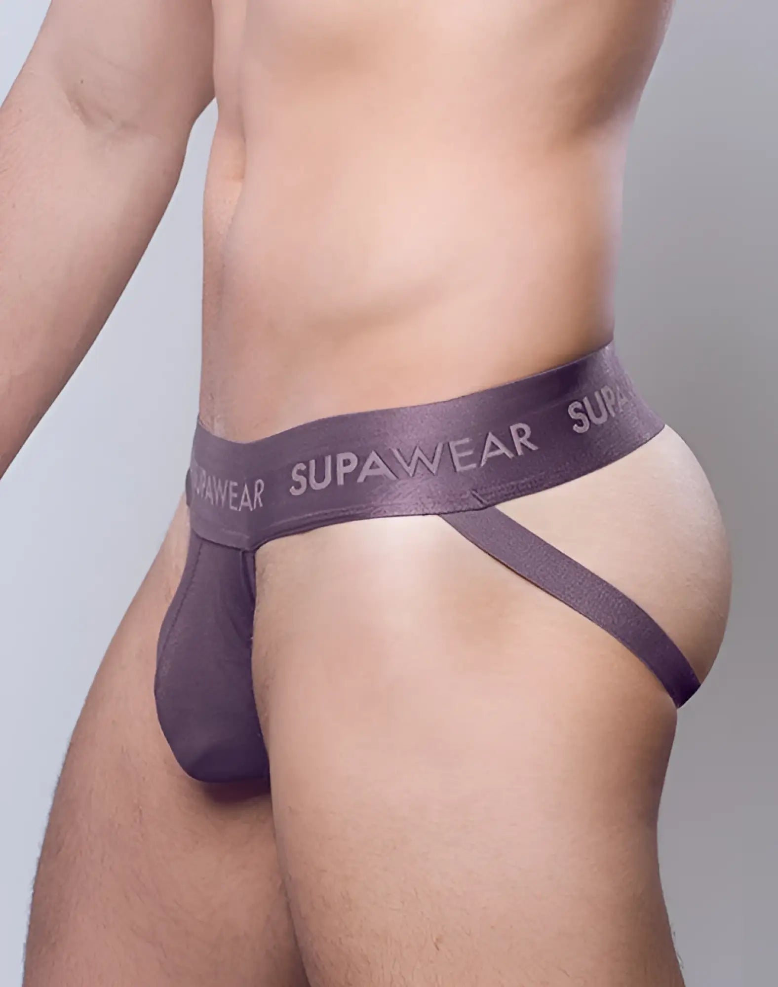 Dark gray supawear ribbed jockstrap underwear with smooth stretchy fabric and wide waistband featuring brand name