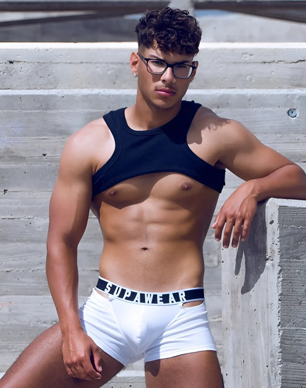 White briefs with black waistband featuring supawear logo in white lettering from supawear ribbed slashed cropped top black collection