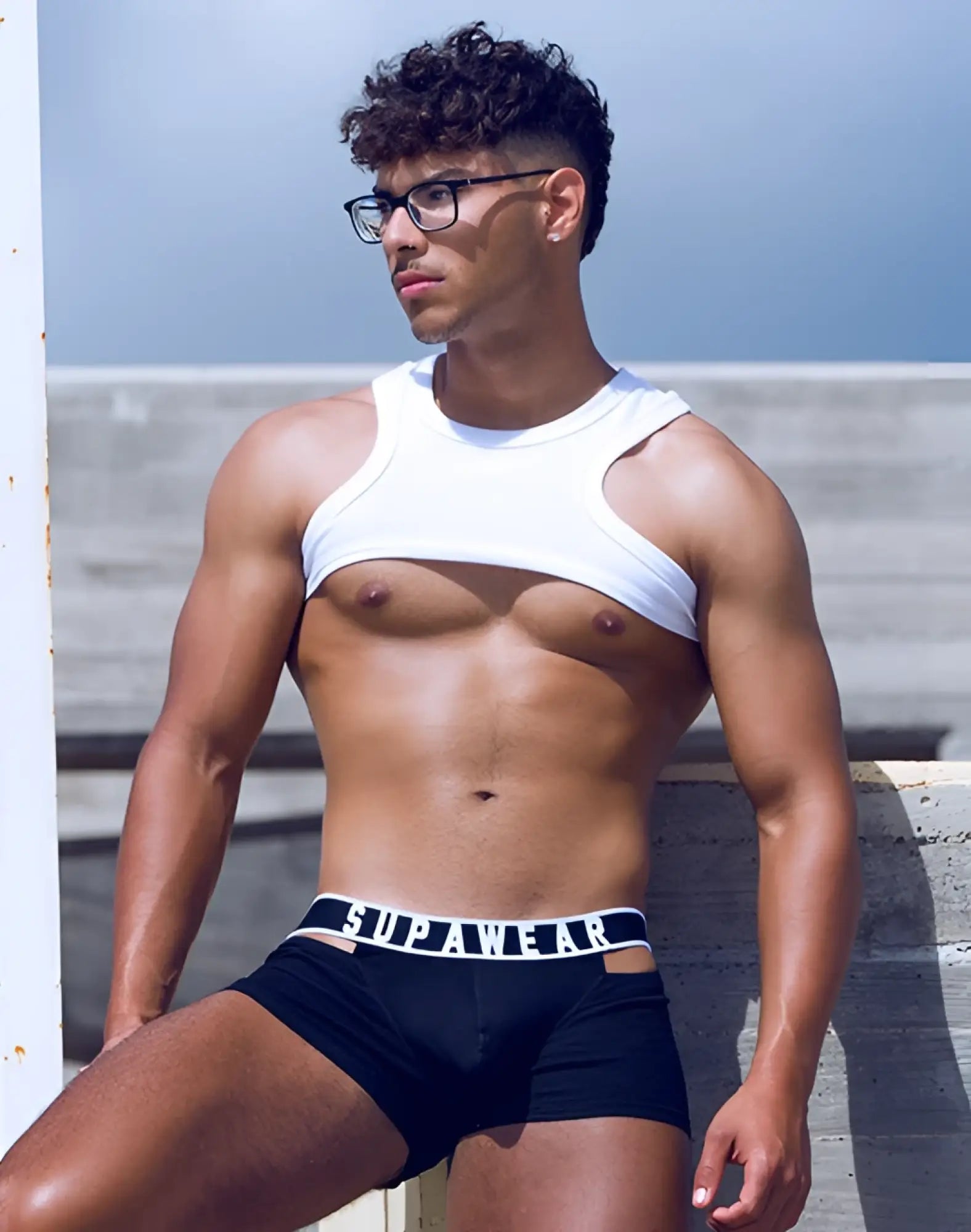 Black supawear boxer briefs with white elastic waistband featuring brand name in bold black lettering