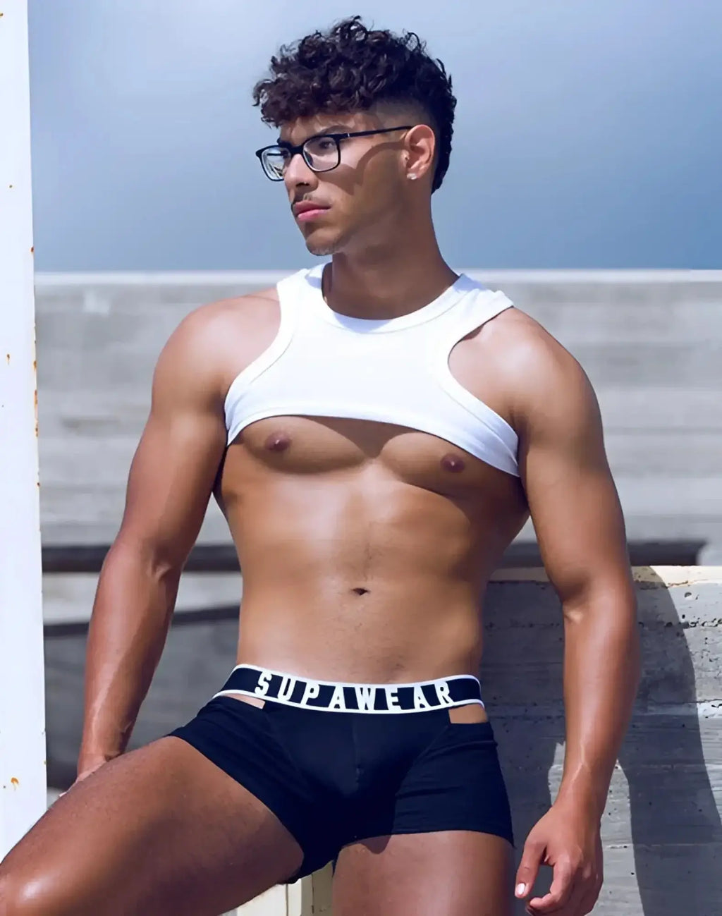 Black supawear boxer briefs with white elastic waistband featuring brand name in bold black lettering