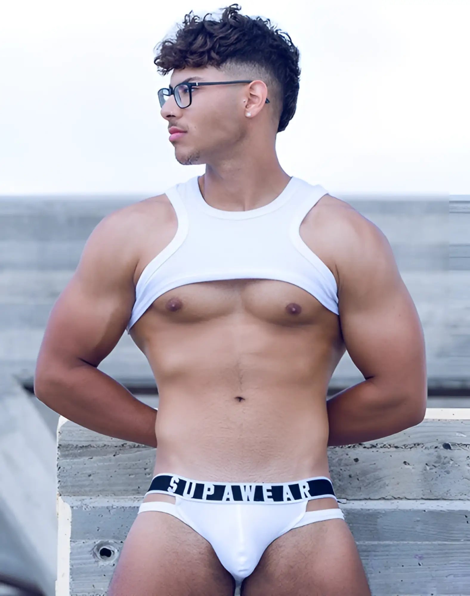 White supawear branded briefs with a black waistband featuring the brand name in white lettering