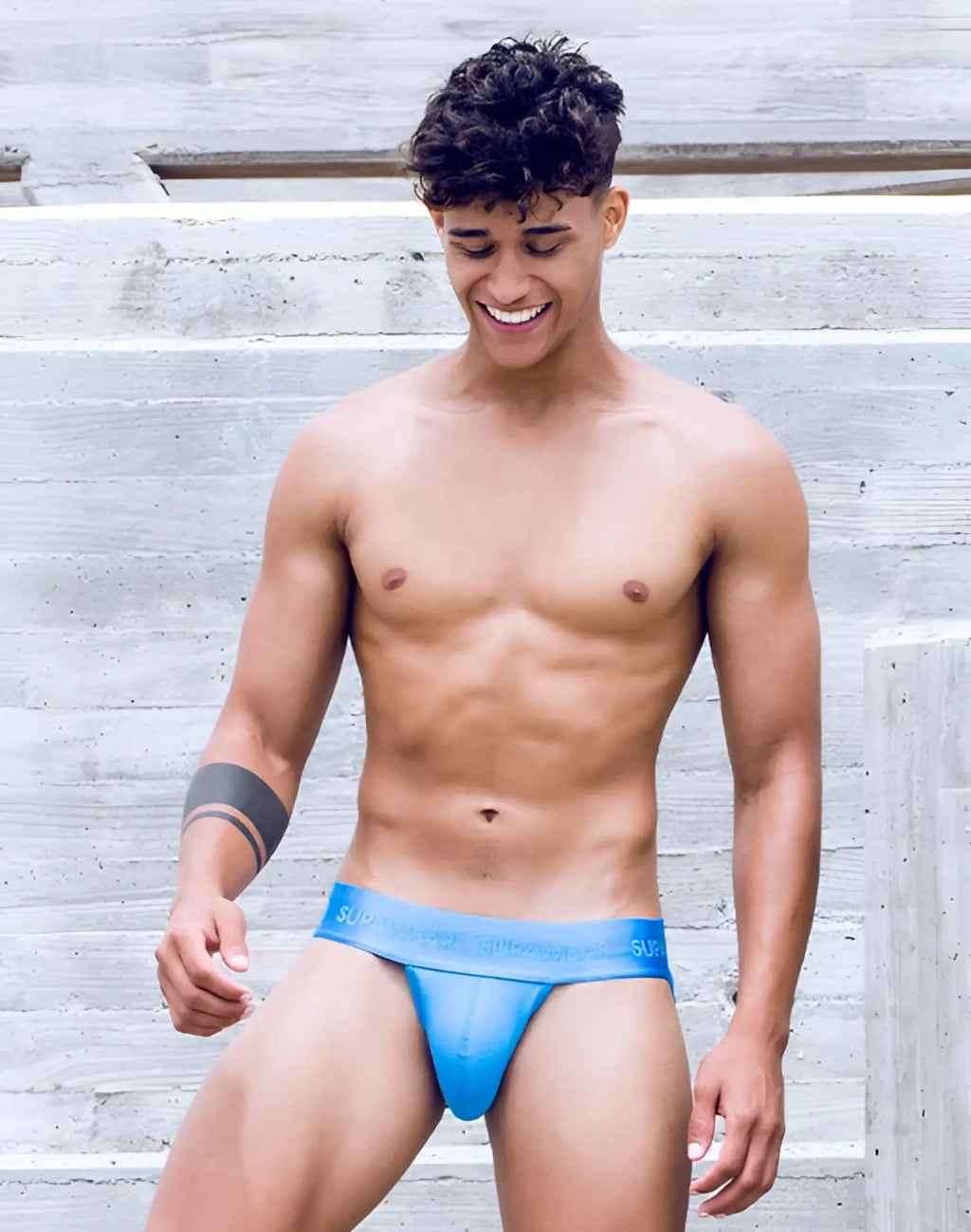 Blue supawear ribbed thong underwear in marina color with snug fit and supreme branded waistband