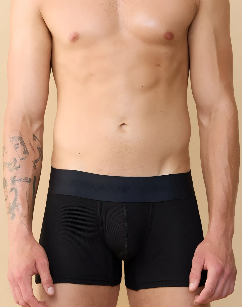 Black supawear ribbed trunk underwear featuring a dark navy elastic waistband with hupawear branding