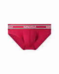 Red supawear ribbed varsity brief underwear featuring a striped waistband with the brand name in white lettering
