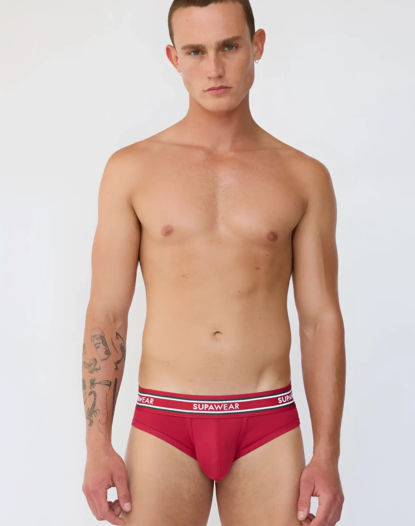 Red supawear ribbed varsity briefs with white elastic waistband and black brand lettering for comfortable underwear use