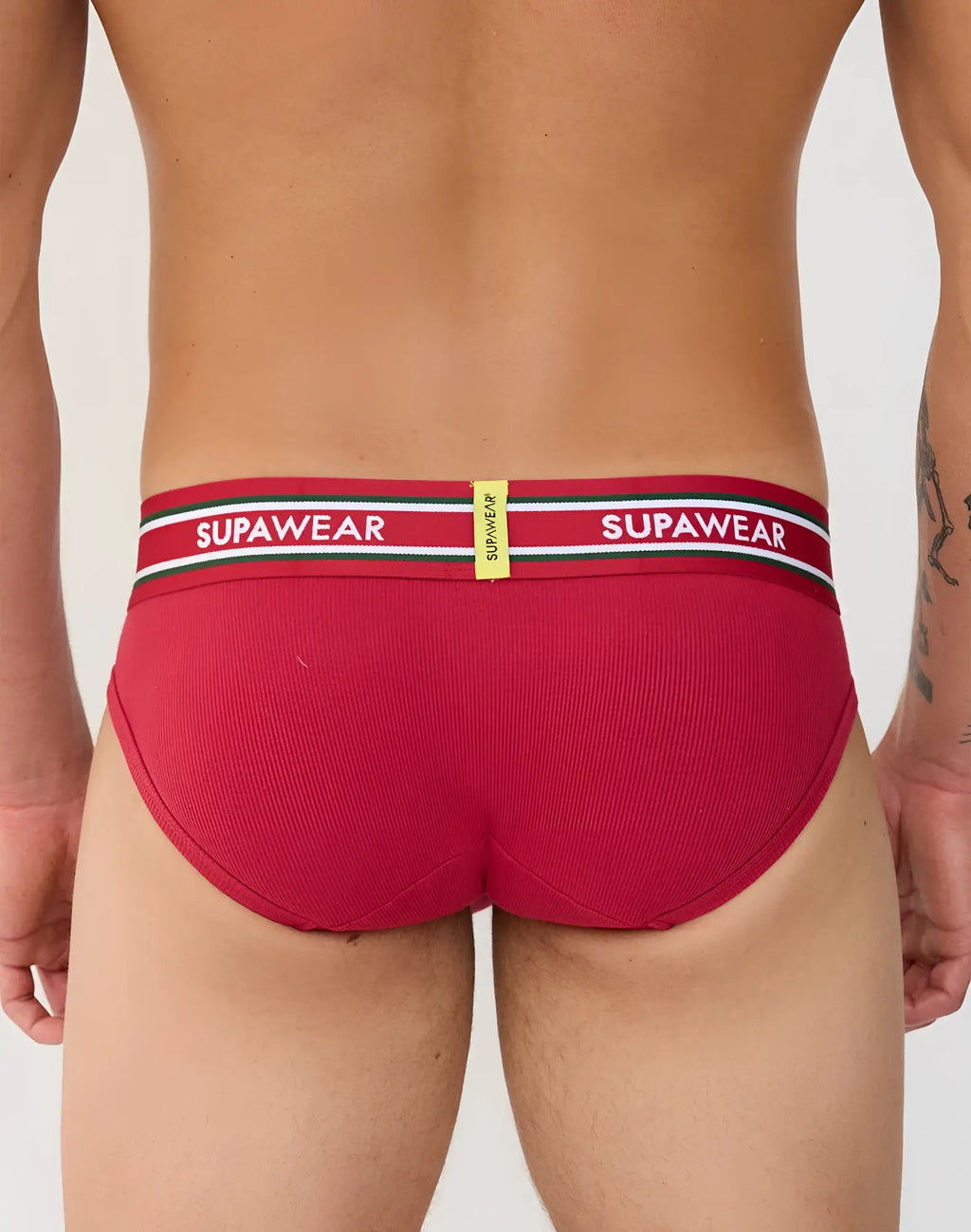 Red ribbed supawear varsity briefs with a white and green branded waistband for comfortable everyday wear