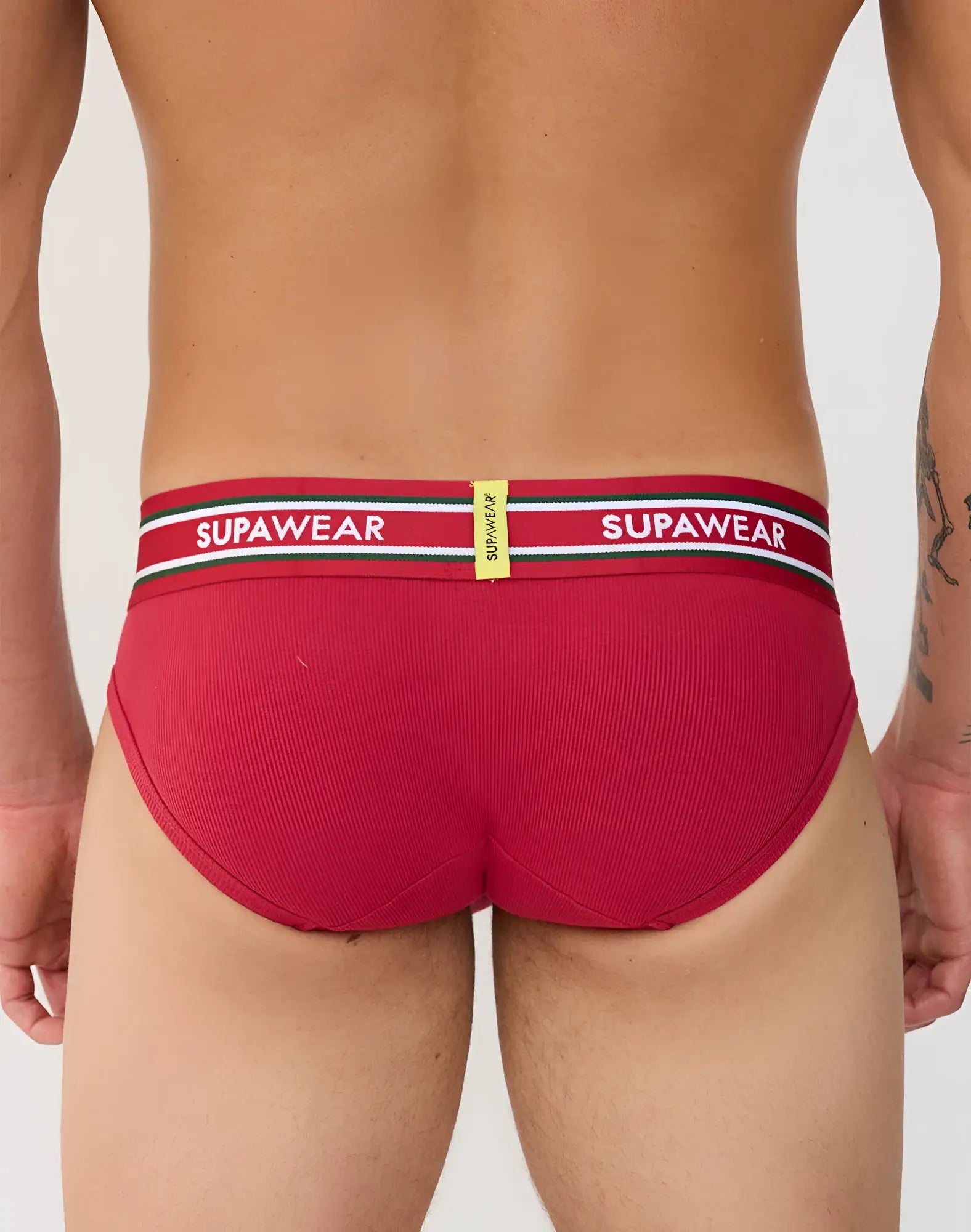 Red ribbed supawear varsity briefs with a white and green branded waistband for comfortable everyday wear