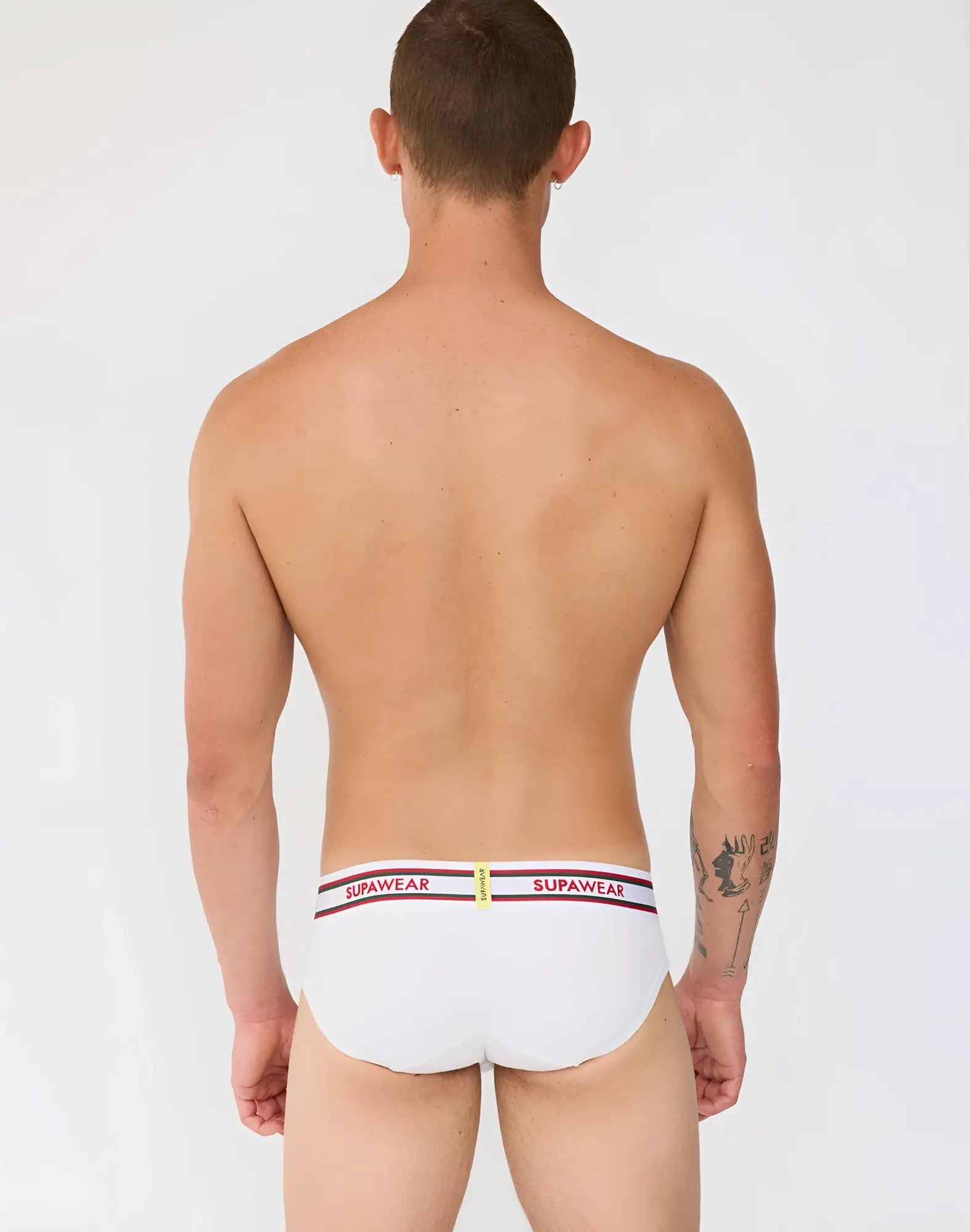 White supawear ribbed varsity briefs with a striped waistband featuring red and black supawear branding