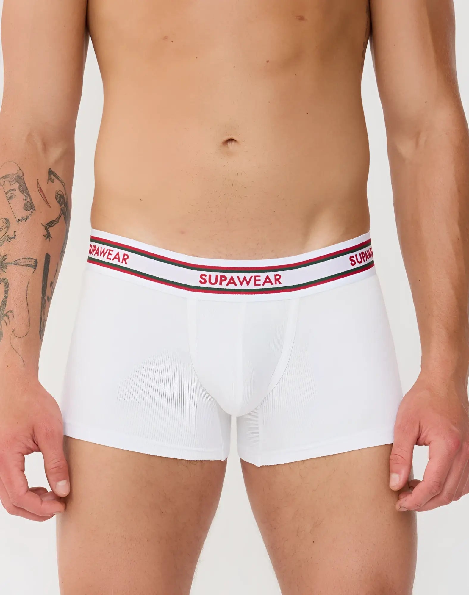 White supawear ribbed varsity trunk underwear with a red and black striped waistband featuring bold brand lettering