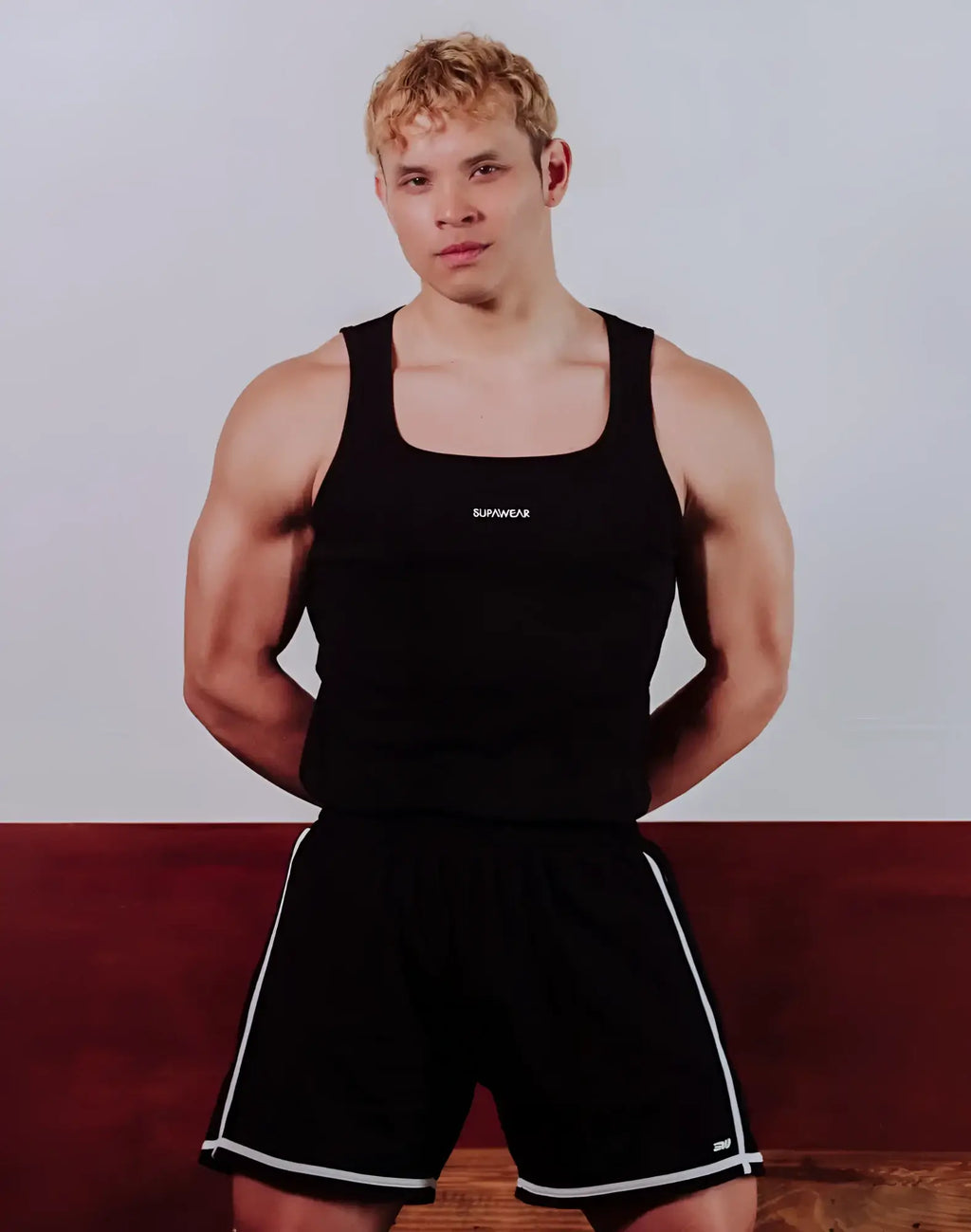SupaWear semi-squared singlet black tank top with white surfwear logo and matching black shorts with white side stripes